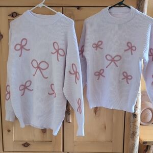 Womens White Knit Sweater with Pink Bow Motif